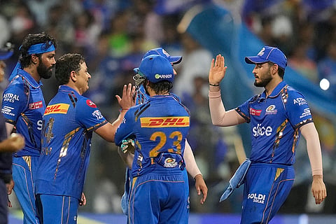Piyush Chawla celebrates KL Rahul's wicket 